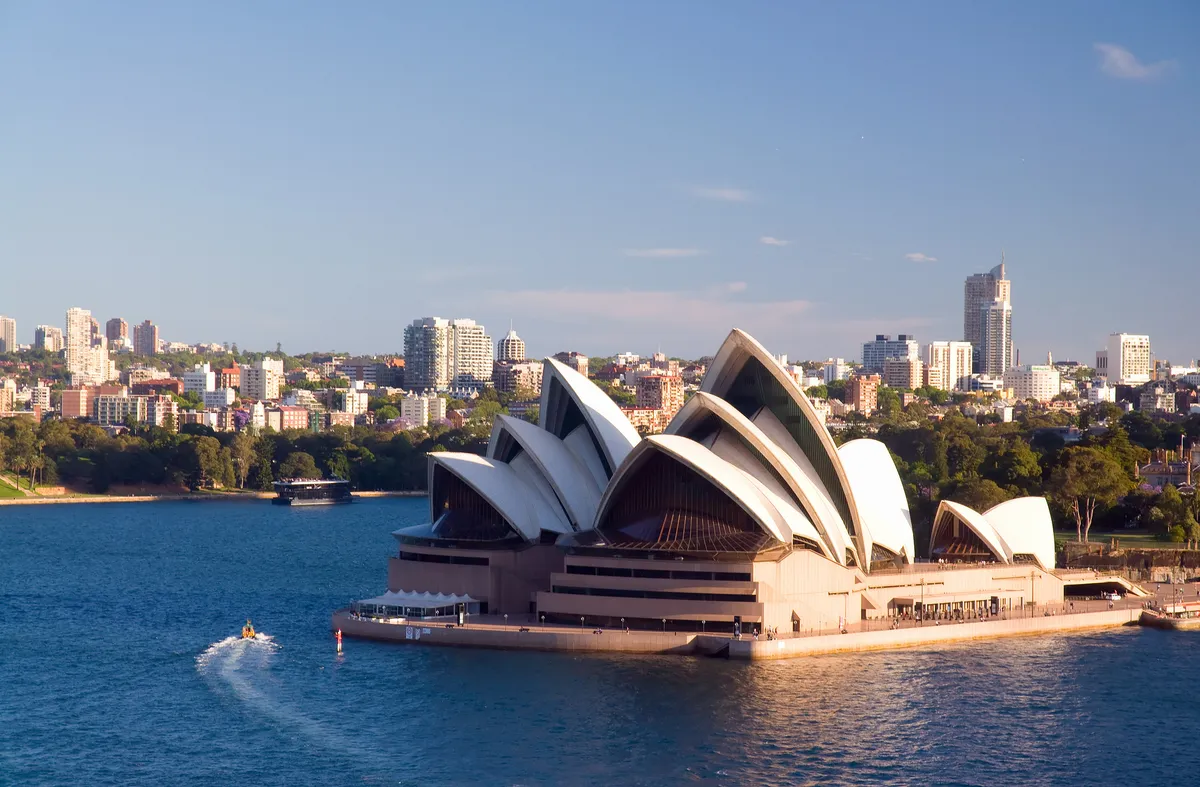 The Sydney Opera House on the harbor in late afternoon light
